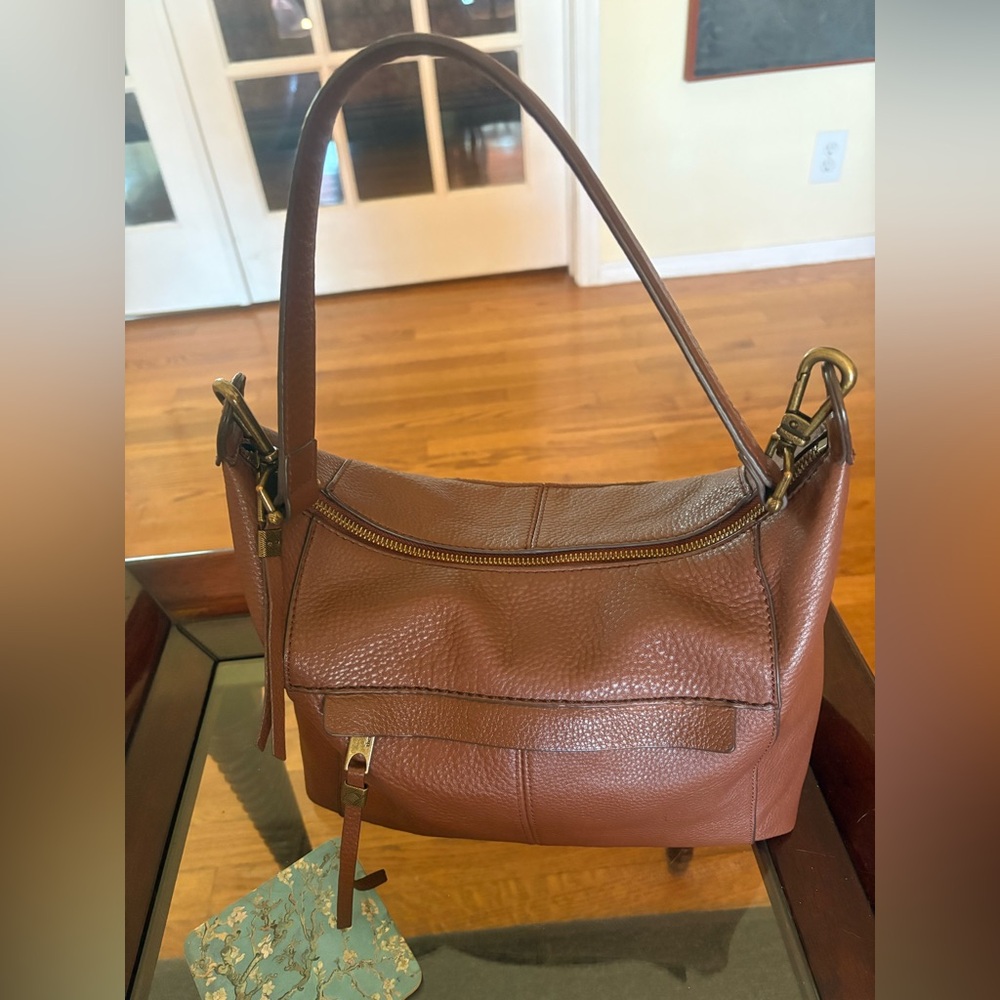 The Sak Brown leather purse,used in very good condition. Bought at Macys 2023.